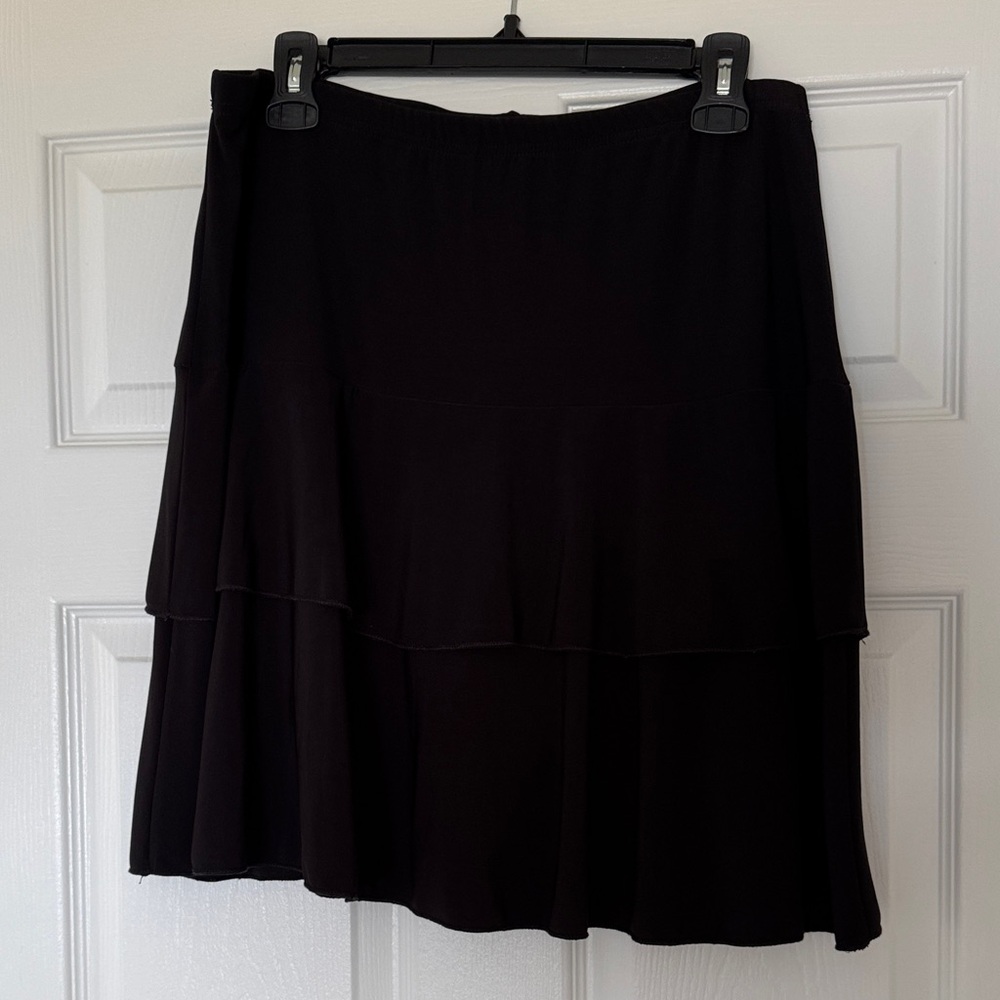 Black ruffled skirt with inner shorts excellent condition